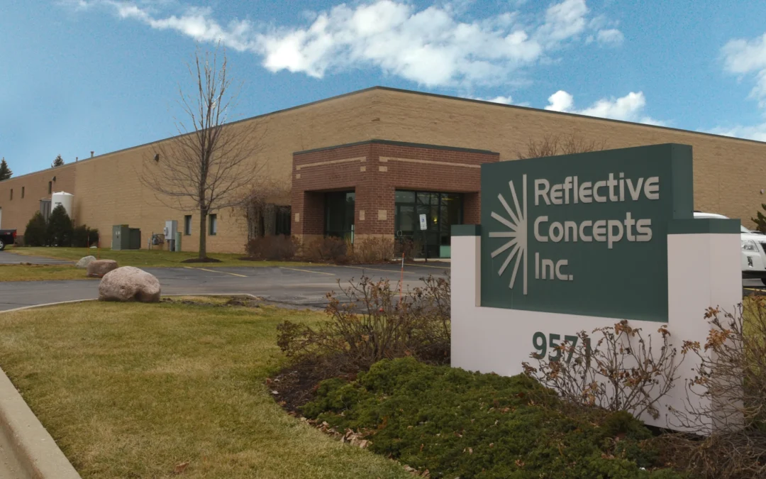 Front of Reflective Concepts Inc. building and signage